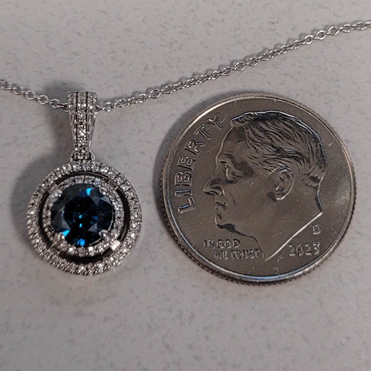 14KWG 1/2ct Blue & White Diamond Halo Necklace